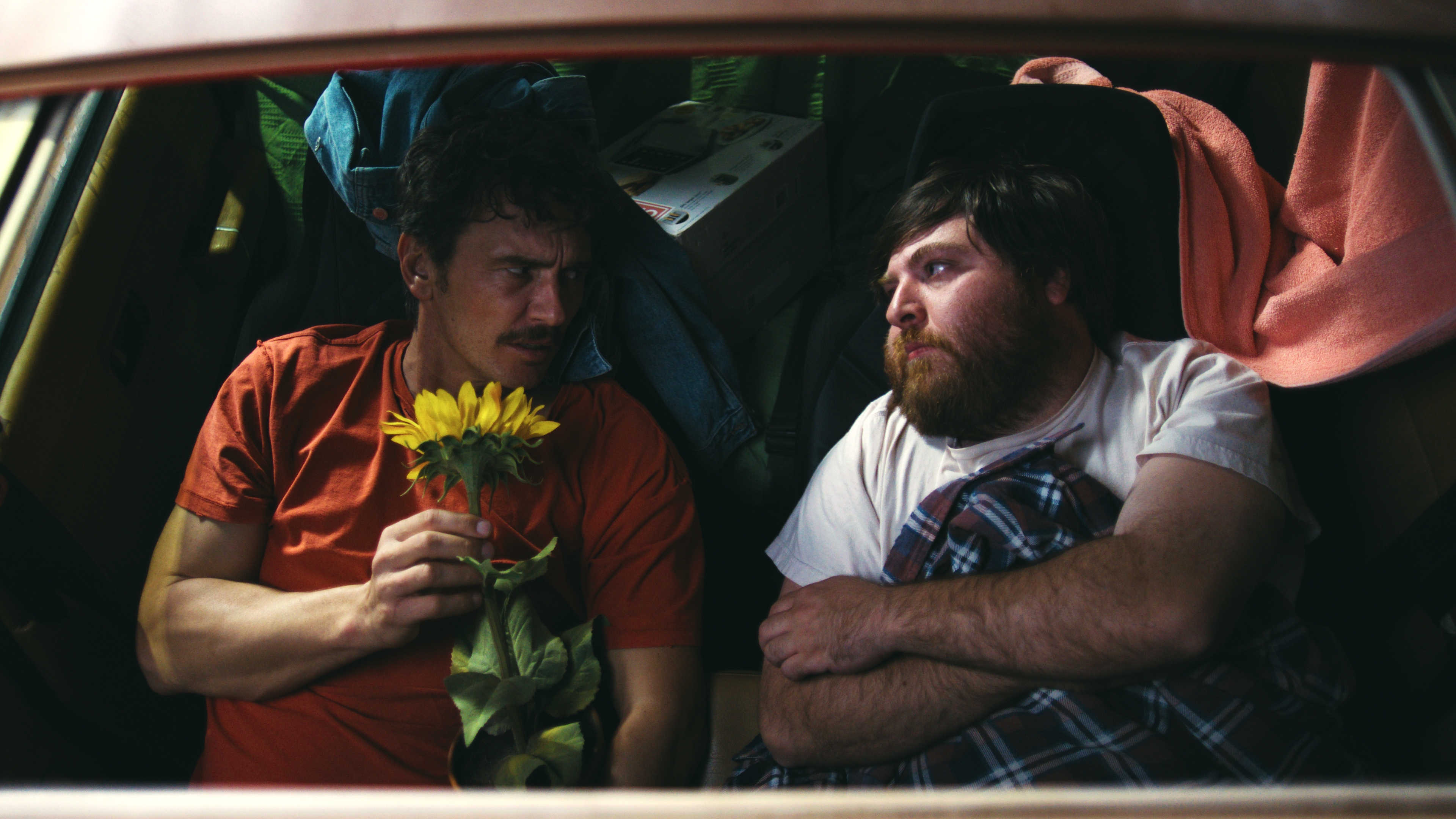 Sunshine production still supplied and identified by Genius Brands, showing two men in a car